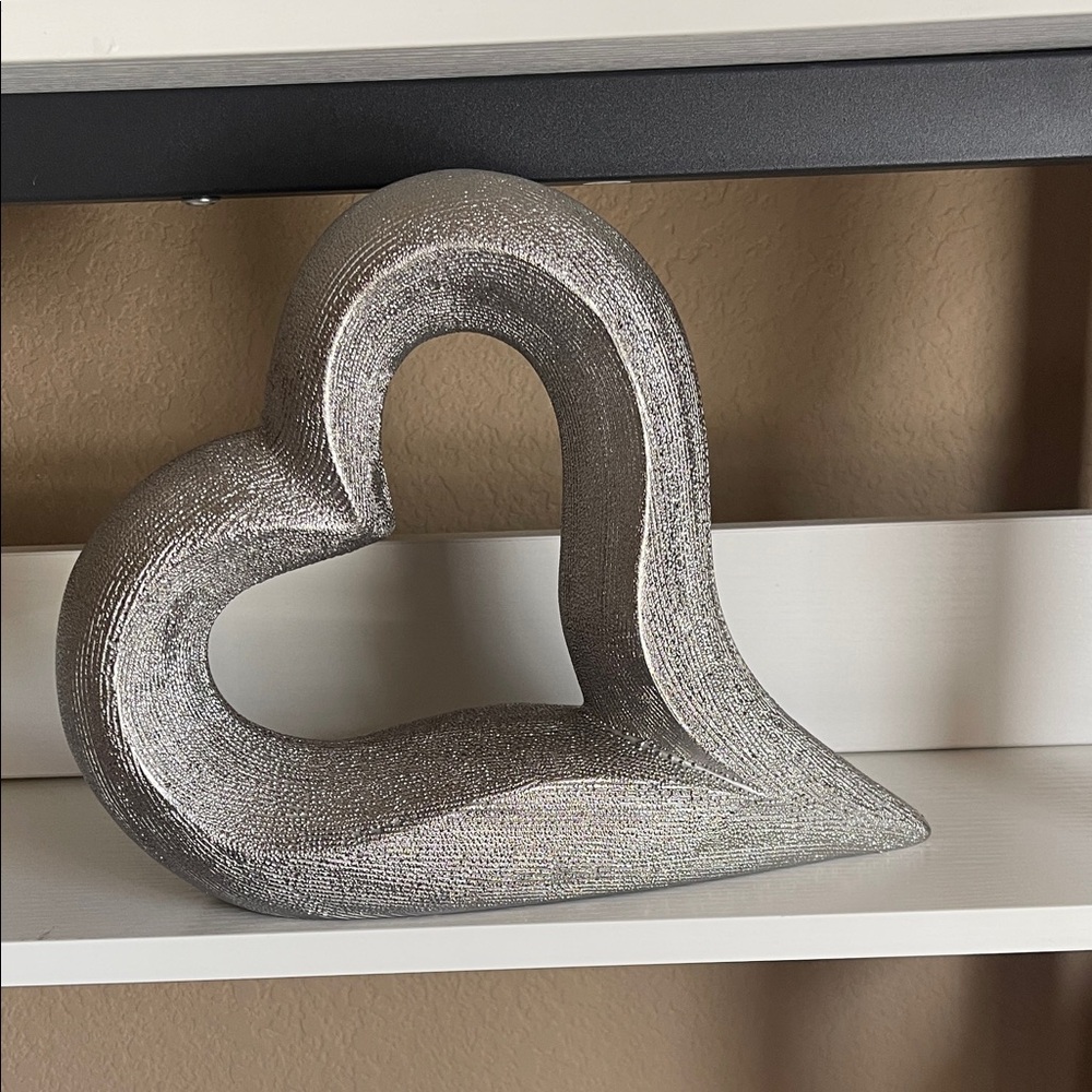 Silver Heart-Shaped Sculpture